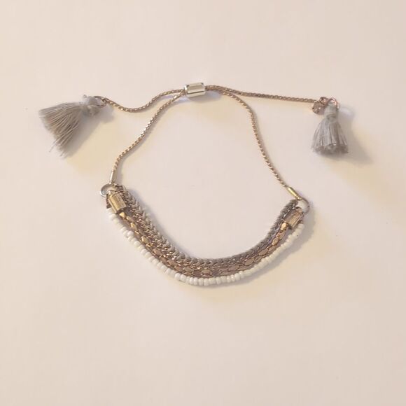 782 Double Gold Chain White Beaded Adjustable‎ Slider Bracelet with Gray Tassels - Picture 3 of 4